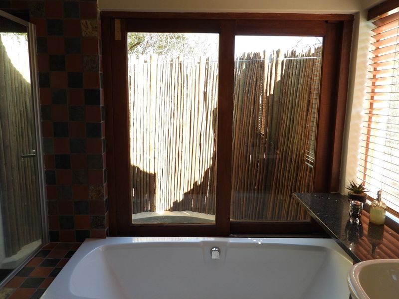 Experience luxury, wildlife, and tranquility in this secluded 2-bedroom lodge retreat - Photo 9