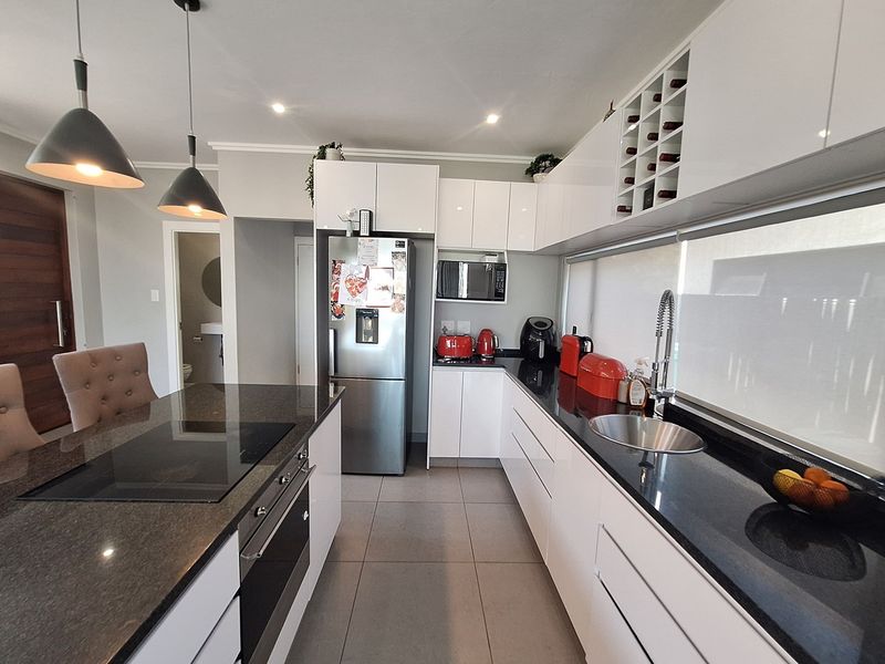 Modern Elegance Meets Tranquil Estate Living at Palm Lakes Estate - Photo 6