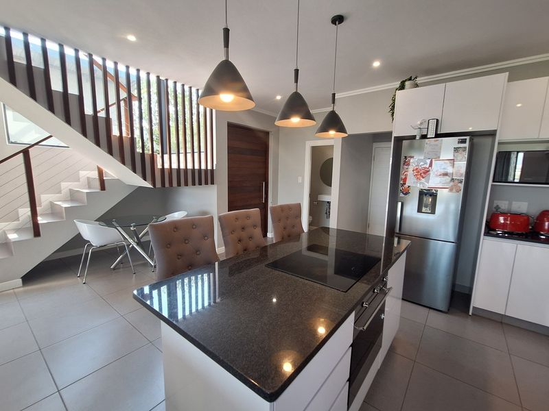 Modern Elegance Meets Tranquil Estate Living at Palm Lakes Estate - Photo 4