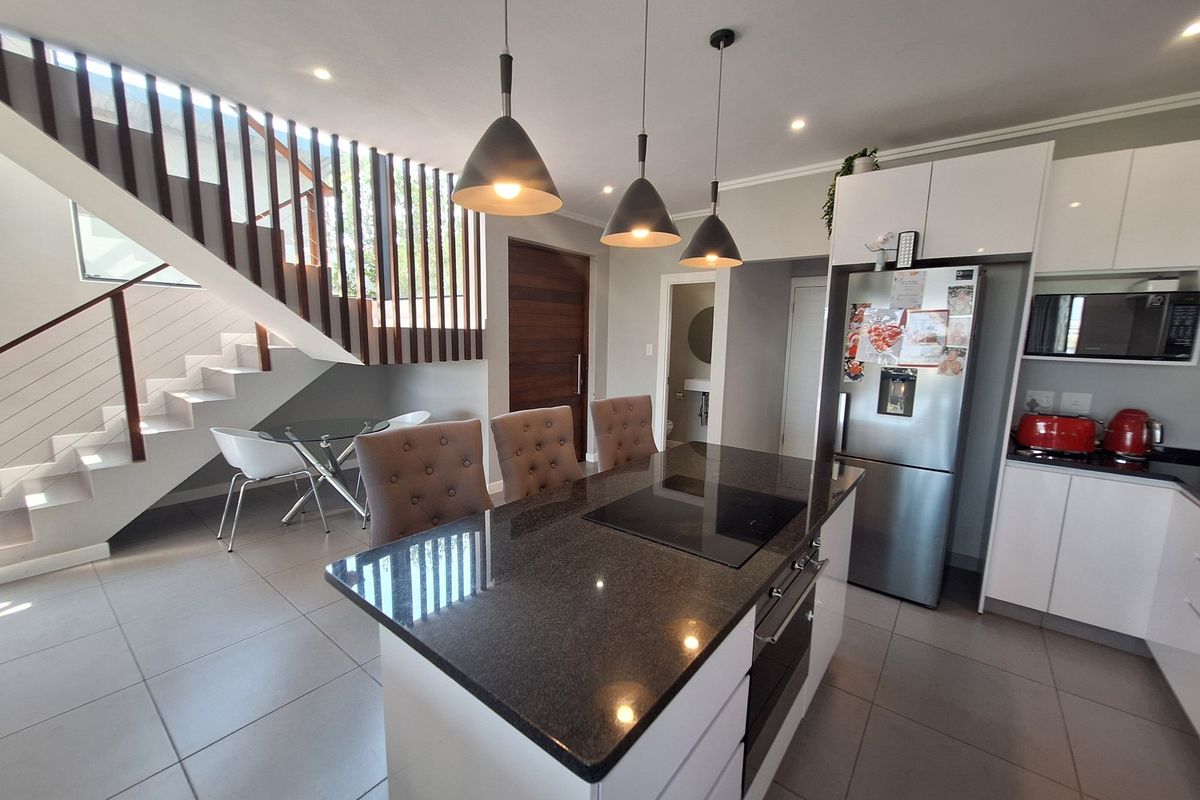 Modern Elegance Meets Tranquil Estate Living at Palm Lakes Estate - Photo 4