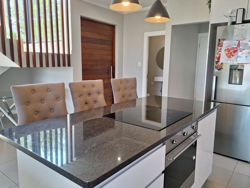 Modern Elegance Meets Tranquil Estate Living at Palm Lakes Estate - Photo 5