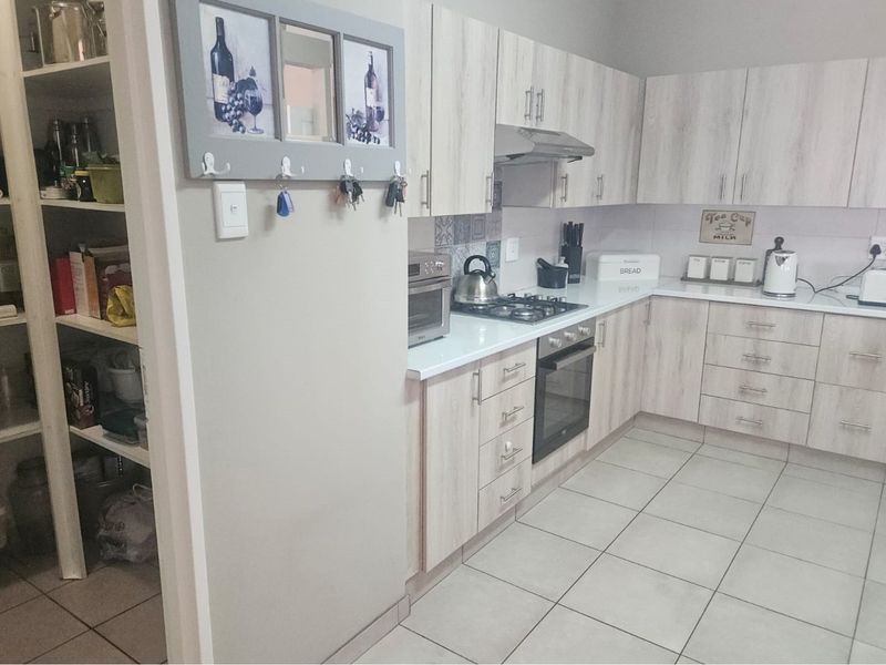 Modern Face Brick Family Home with Solar Power & Entertainment Area - Photo 9