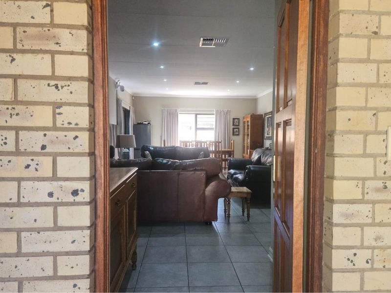 Modern Face Brick Family Home with Solar Power & Entertainment Area - Photo 6