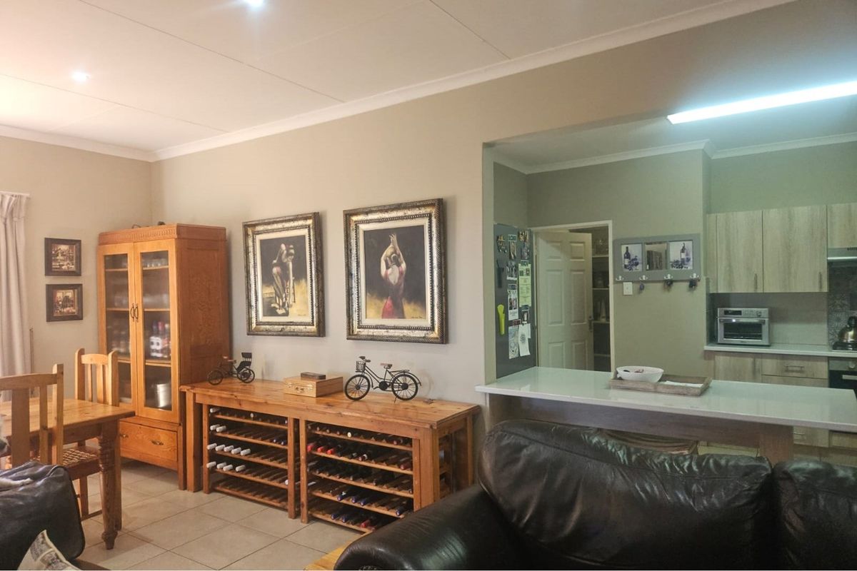 Modern Face Brick Family Home with Solar Power & Entertainment Area - Photo 5