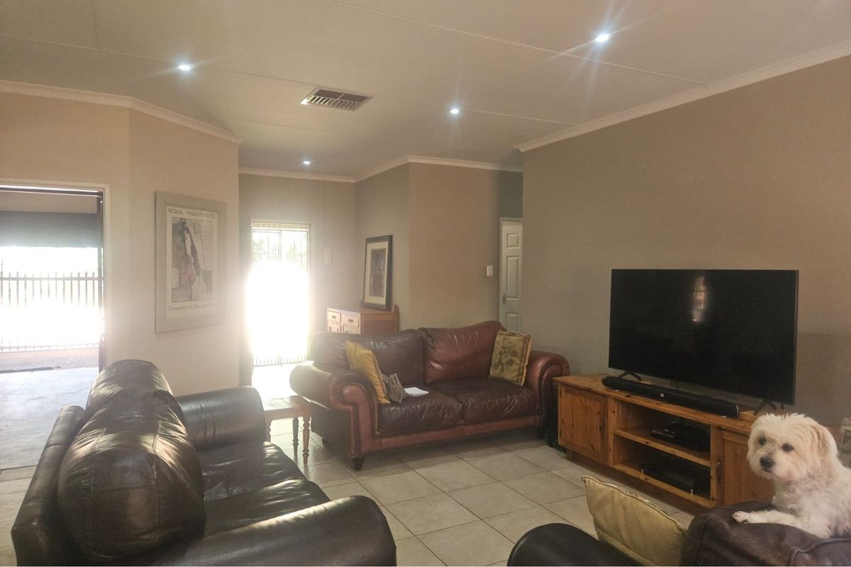 Modern Face Brick Family Home with Solar Power & Entertainment Area - Photo 4