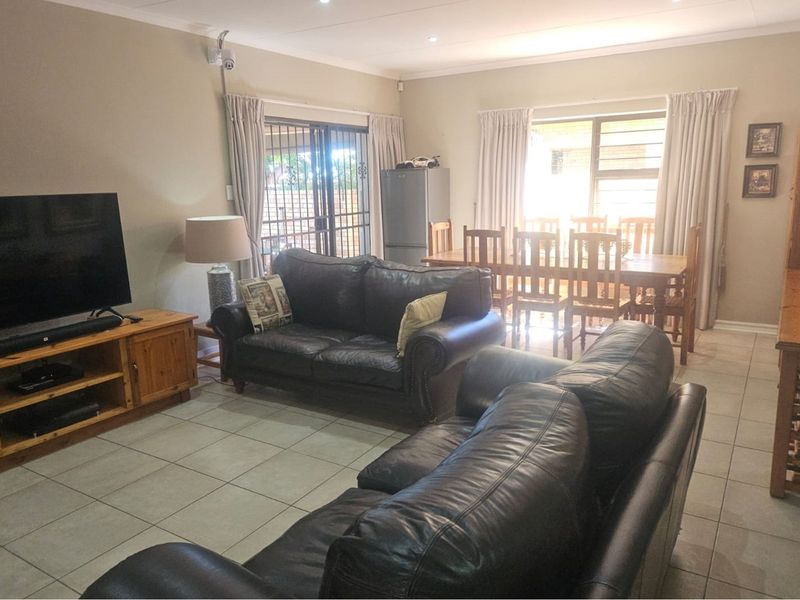 Modern Face Brick Family Home with Solar Power & Entertainment Area - Photo 3