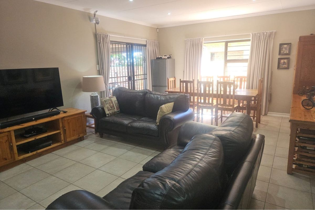 Modern Face Brick Family Home with Solar Power & Entertainment Area - Photo 3