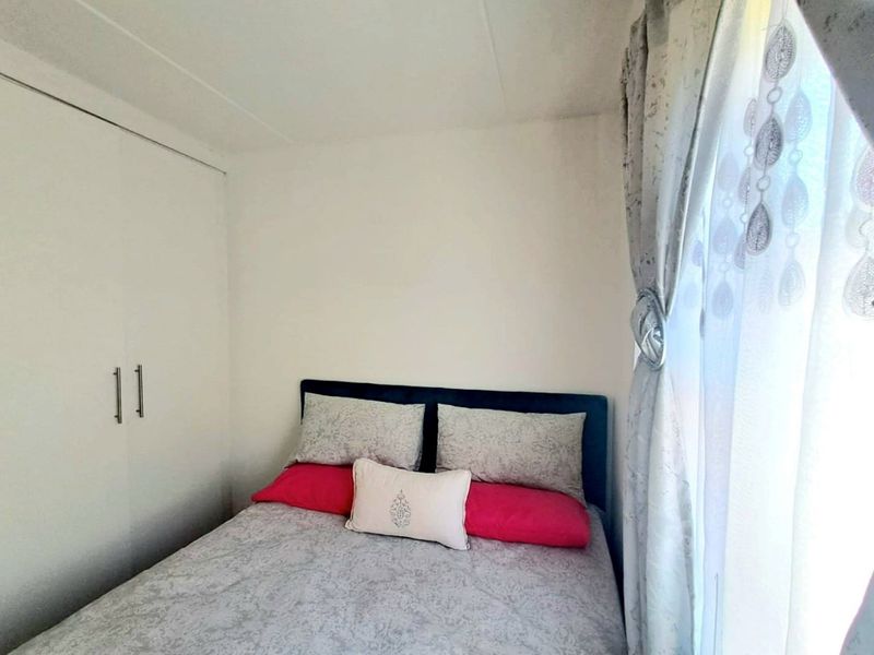 Modern 2-Bedroom Apartment in The Pines Security Complex - Photo 10