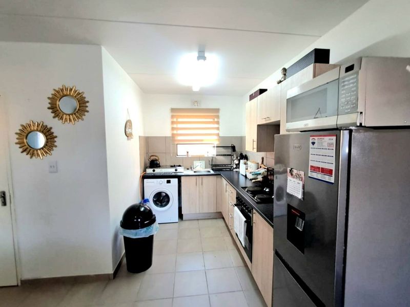 Modern 2-Bedroom Apartment in The Pines Security Complex - Photo 4