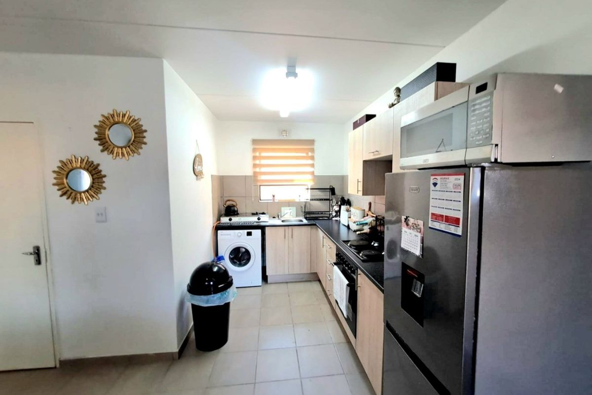 Modern 2-Bedroom Apartment in The Pines Security Complex - Photo 4