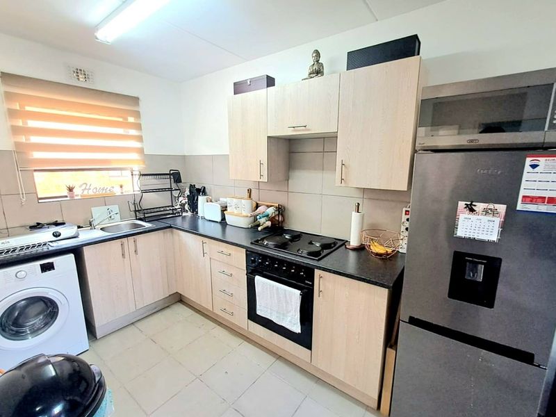 Modern 2-Bedroom Apartment in The Pines Security Complex - Photo 5