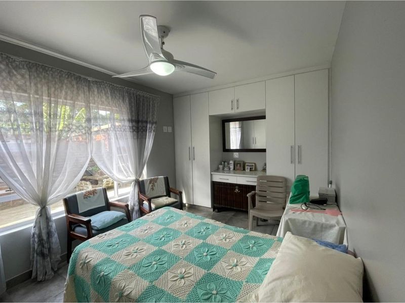 Modern Dual-Living Oasis: 2-Bed Home + 2-Bed Flat in Eco-Friendly Gqunube Green - Photo 9