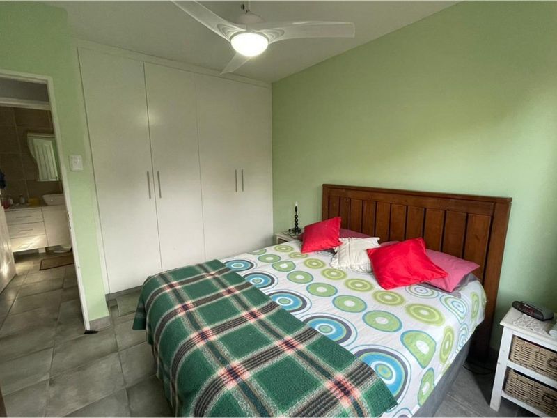 Modern Dual-Living Oasis: 2-Bed Home + 2-Bed Flat in Eco-Friendly Gqunube Green - Photo 7
