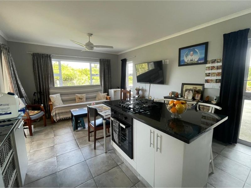 Modern Dual-Living Oasis: 2-Bed Home + 2-Bed Flat in Eco-Friendly Gqunube Green - Photo 5