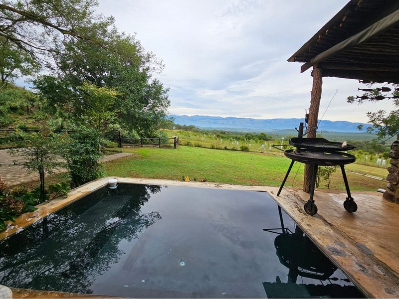 Beautiful 10ha farm with 4 bedroom house, outside buildings, 2 bore holes and trees - Photo 2