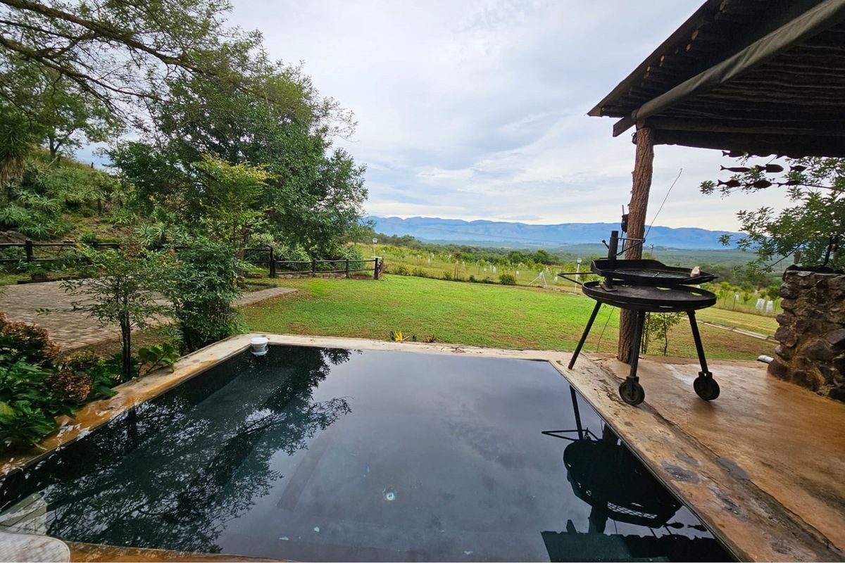 Beautiful 10ha farm with 4 bedroom house, outside buildings, 2 bore holes and trees - Photo 2