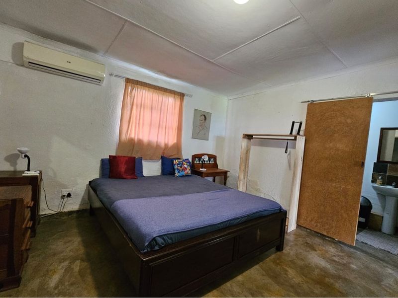 Beautiful 10ha farm with 4 bedroom house, outside buildings, 2 bore holes and trees - Photo 10