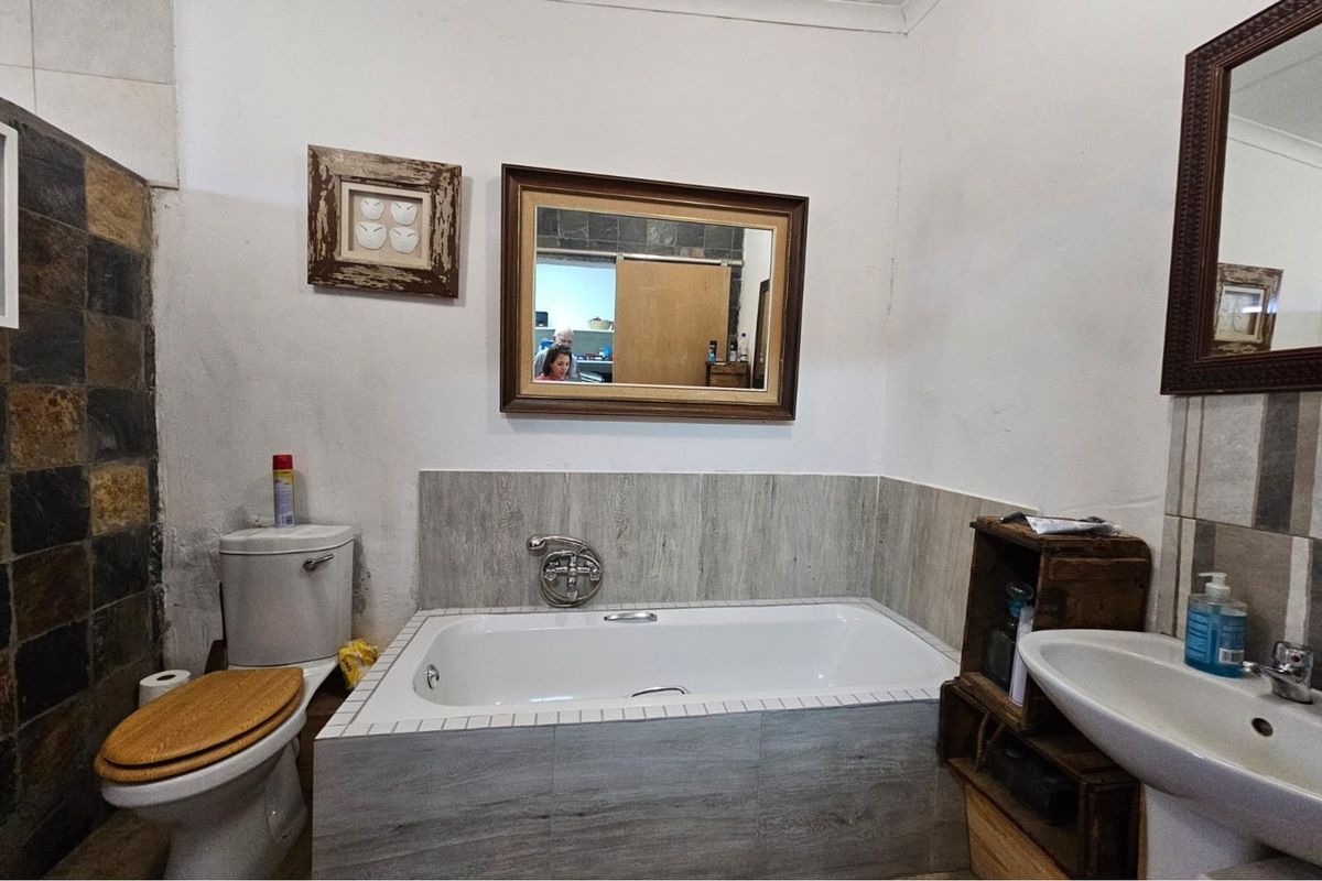 Beautiful 10ha farm with 4 bedroom house, outside buildings, 2 bore holes and trees - Photo 5