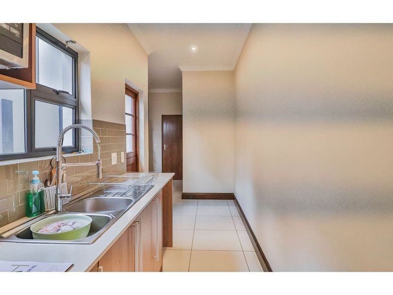 Modern Luxury Meets Family Comfort in Prestigious Sagewood - Photo 10