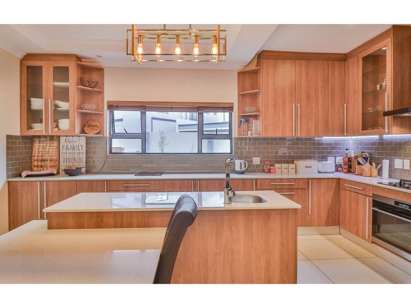 Modern Luxury Meets Family Comfort in Prestigious Sagewood - Photo 8