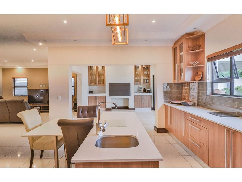 Modern Luxury Meets Family Comfort in Prestigious Sagewood - Photo 6