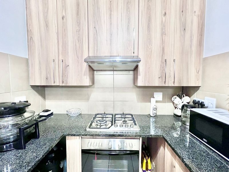 Top-Floor Apartment with Inverter and Gas Stove,  in Secure Sagewood Complex - Photo 10