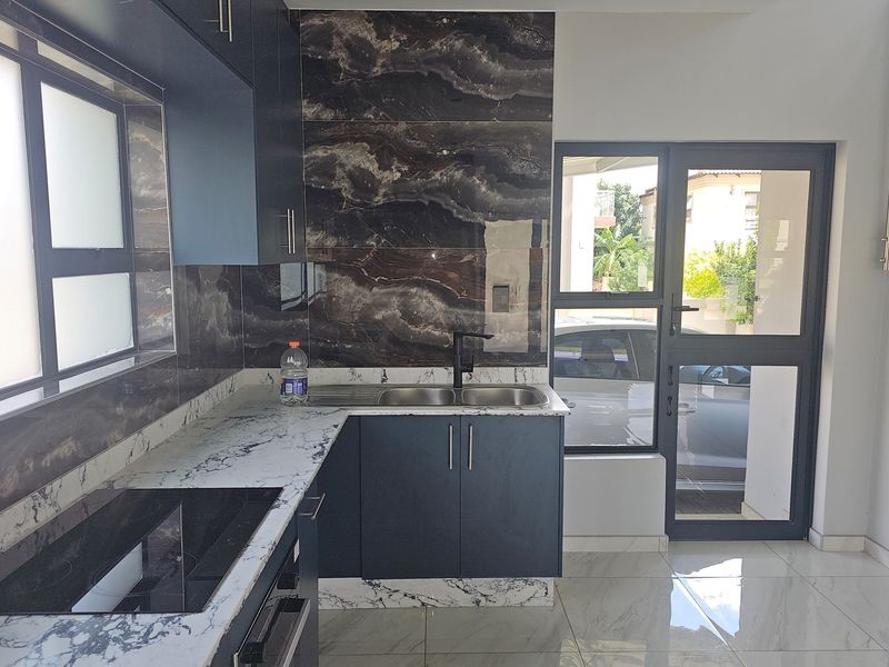 Stylish immaculate 3-Bedroom Double Storey Home in Exclusive Midrand Estate for sale - Photo 9