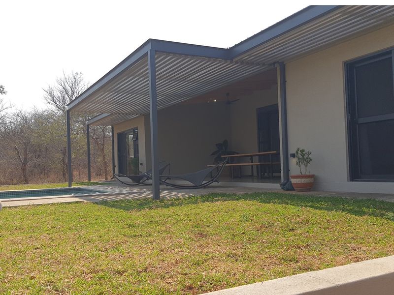 Luxurious  3 bedroom Home in sought after Zandspruit Bush and  Aero Estate bordering Hoedspruit Town - Photo 3