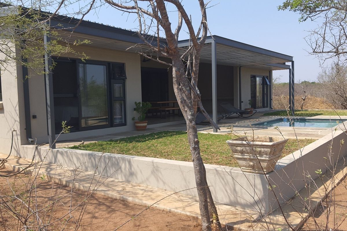 Luxurious  3 bedroom Home in sought after Zandspruit Bush and  Aero Estate bordering Hoedspruit Town - Photo 2
