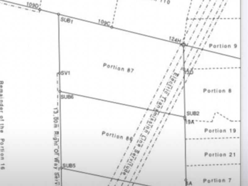 A digital map or survey plan showing property portions and registered servitudes, including an electric transmission line servitude.