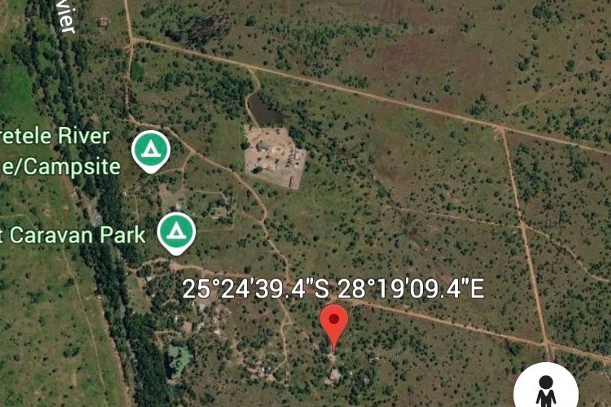 An aerial satellite view showing the rural farm property location and surrounding landscape.