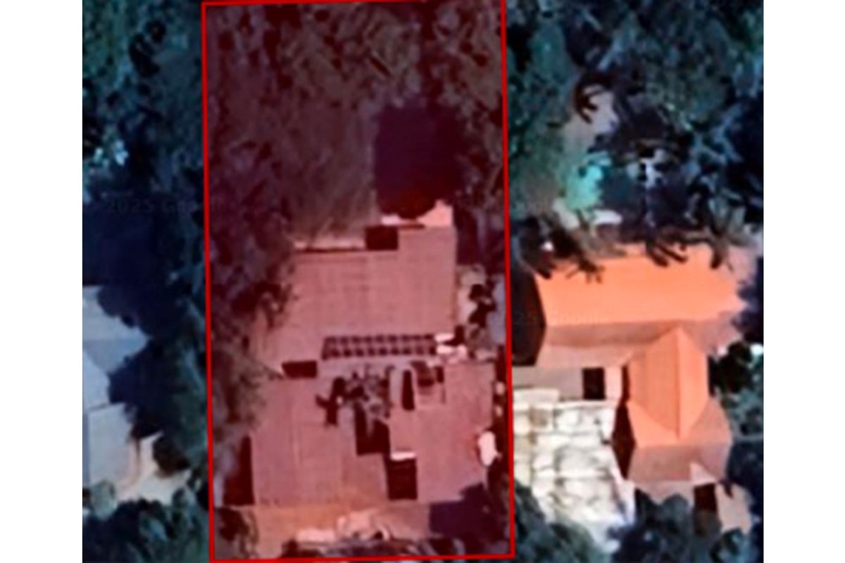 An aerial view of the residential property showing the building footprint and surrounding land area.