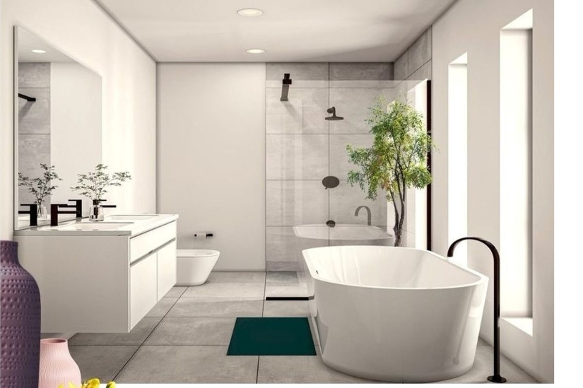 Modern bathroom featuring a freestanding bathtub, walk-in glass shower, wall-mounted vanity, and large format floor tiles.