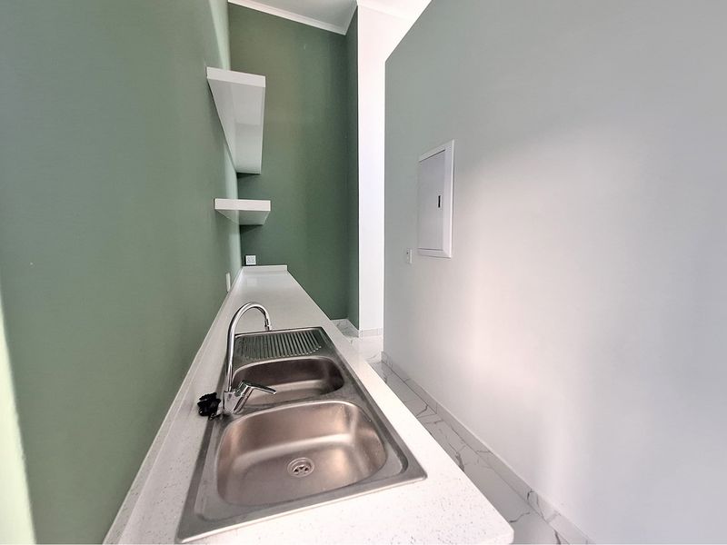 Modern Elegance Meets Coastal Tranquility at Palm Lakes Estate - Photo 8