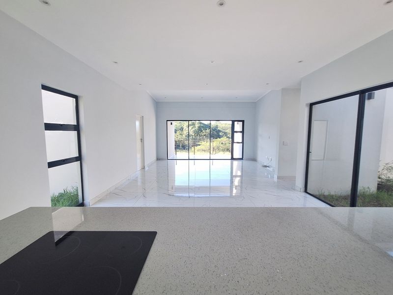 Modern Elegance Meets Coastal Tranquility at Palm Lakes Estate - Photo 5