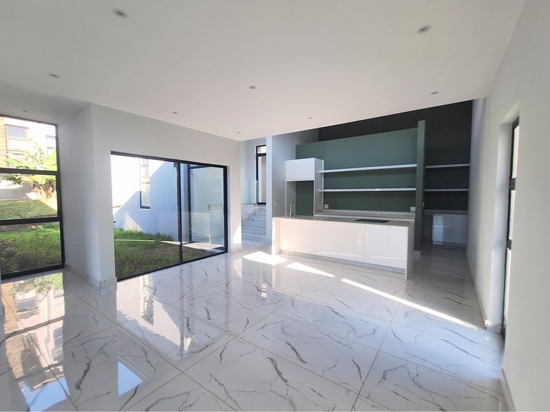 Modern Elegance Meets Coastal Tranquility at Palm Lakes Estate - Photo 9