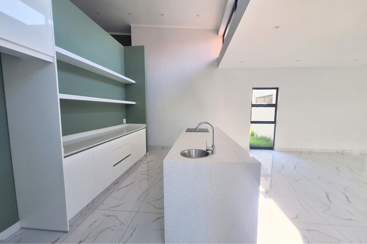 Modern Elegance Meets Coastal Tranquility at Palm Lakes Estate - Photo 4