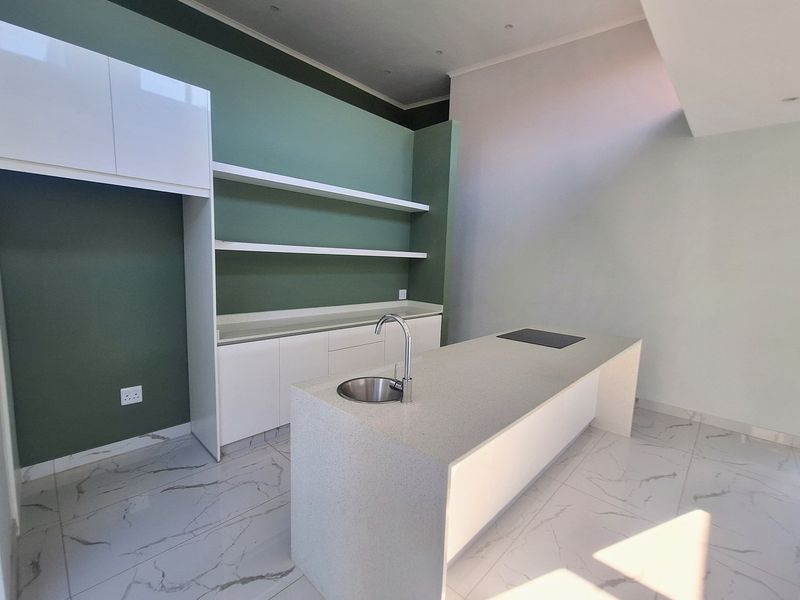 Modern Elegance Meets Coastal Tranquility at Palm Lakes Estate - Photo 3