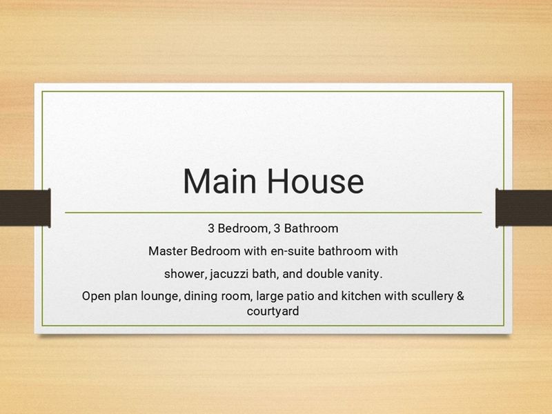 A summary slide detailing the property features including three bedrooms, three bathrooms, open plan living areas, and a kitchen with a scullery.