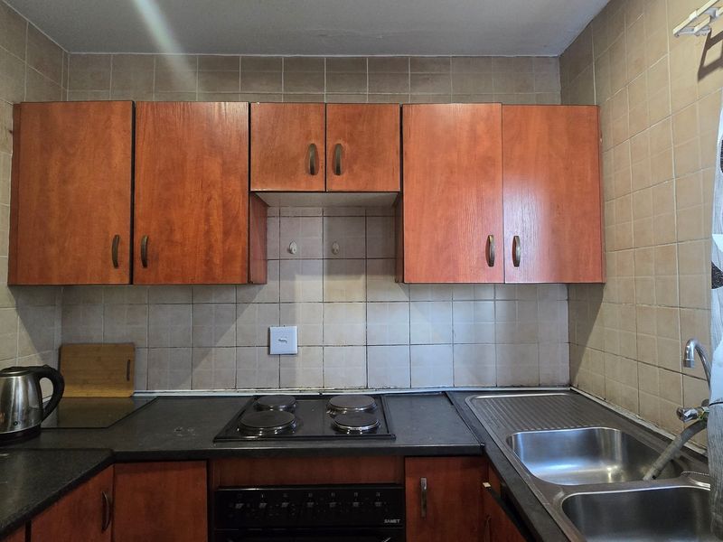 Neat and Secure - First-Floor Apartment with Great Potential and Prime Location! - Photo 3