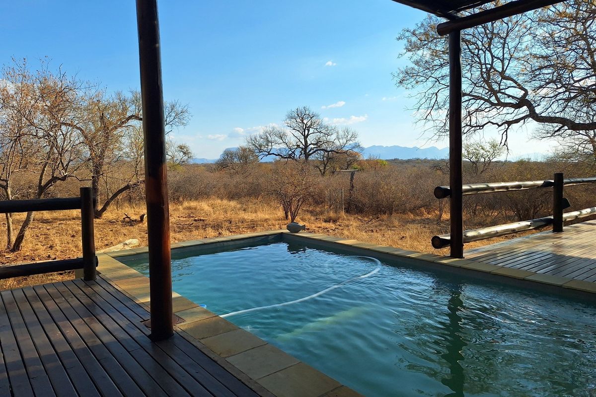 "Find Serenity at Raptors View Wildlife Estate" - Photo 4