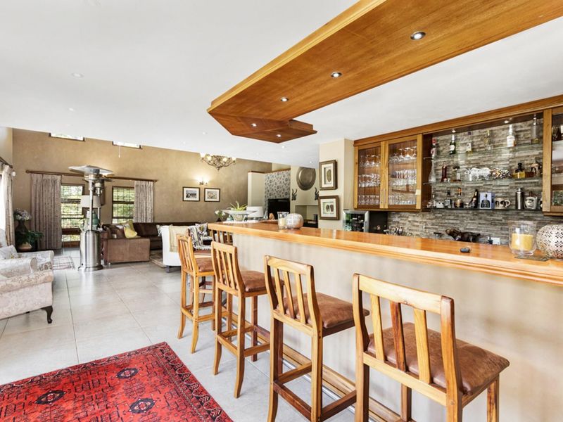 Elegant 5-Bedroom Home with Expansive Living Spaces and Exceptional Amenities - Photo 8