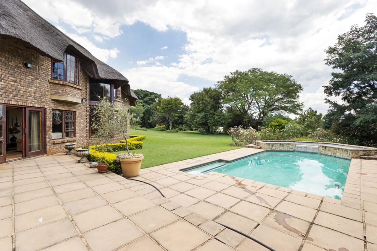 Elegant 5-Bedroom Home with Expansive Living Spaces and Exceptional Amenities - Photo 3