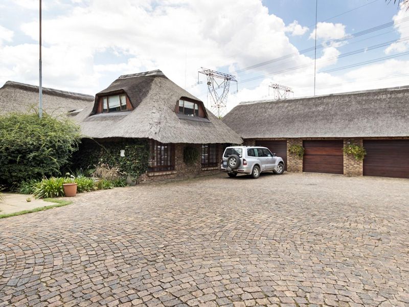 Elegant 5-Bedroom Home with Expansive Living Spaces and Exceptional Amenities - Photo 2