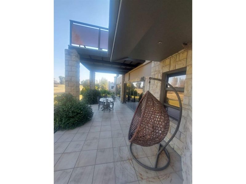 This residence encapsulates modern living at its finest. It's a harmonious blend of style, comfort, - Photo 10