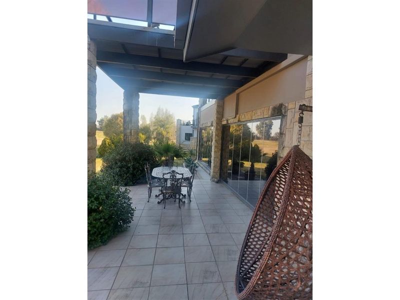 This residence encapsulates modern living at its finest. It's a harmonious blend of style, comfort, - Photo 9