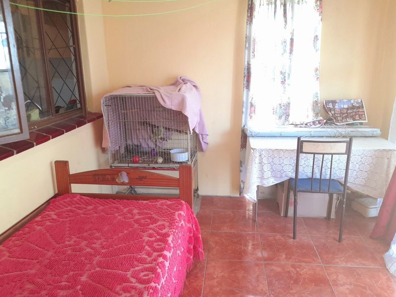 Discover this beautiful Stunning Five-Bedroom Extended Home in Brookdale, Phoenix. - Photo 9