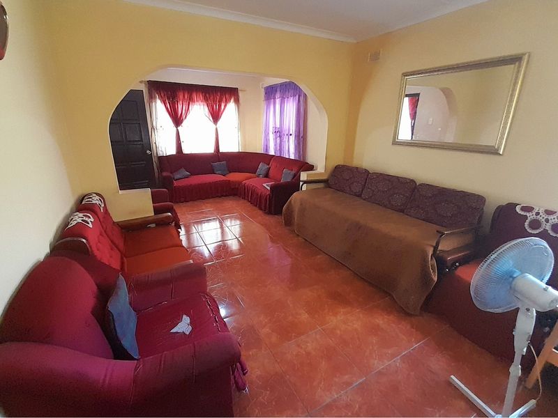 Discover this beautiful Stunning Five-Bedroom Extended Home in Brookdale, Phoenix. - Photo 8