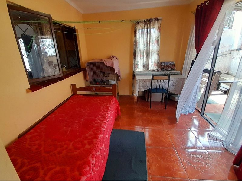 Discover this beautiful Stunning Five-Bedroom Extended Home in Brookdale, Phoenix. - Photo 7