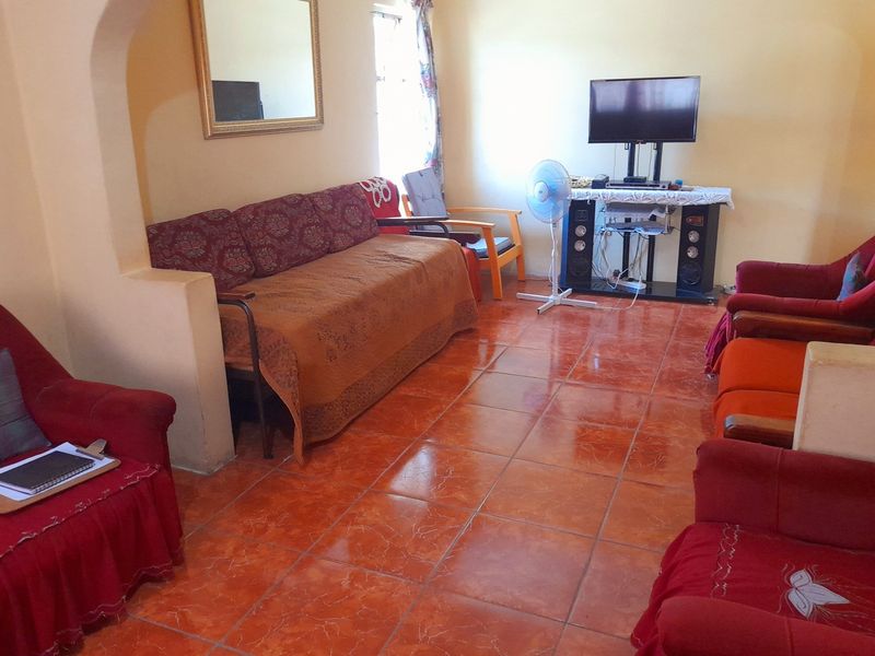 Discover this beautiful Stunning Five-Bedroom Extended Home in Brookdale, Phoenix. - Photo 6